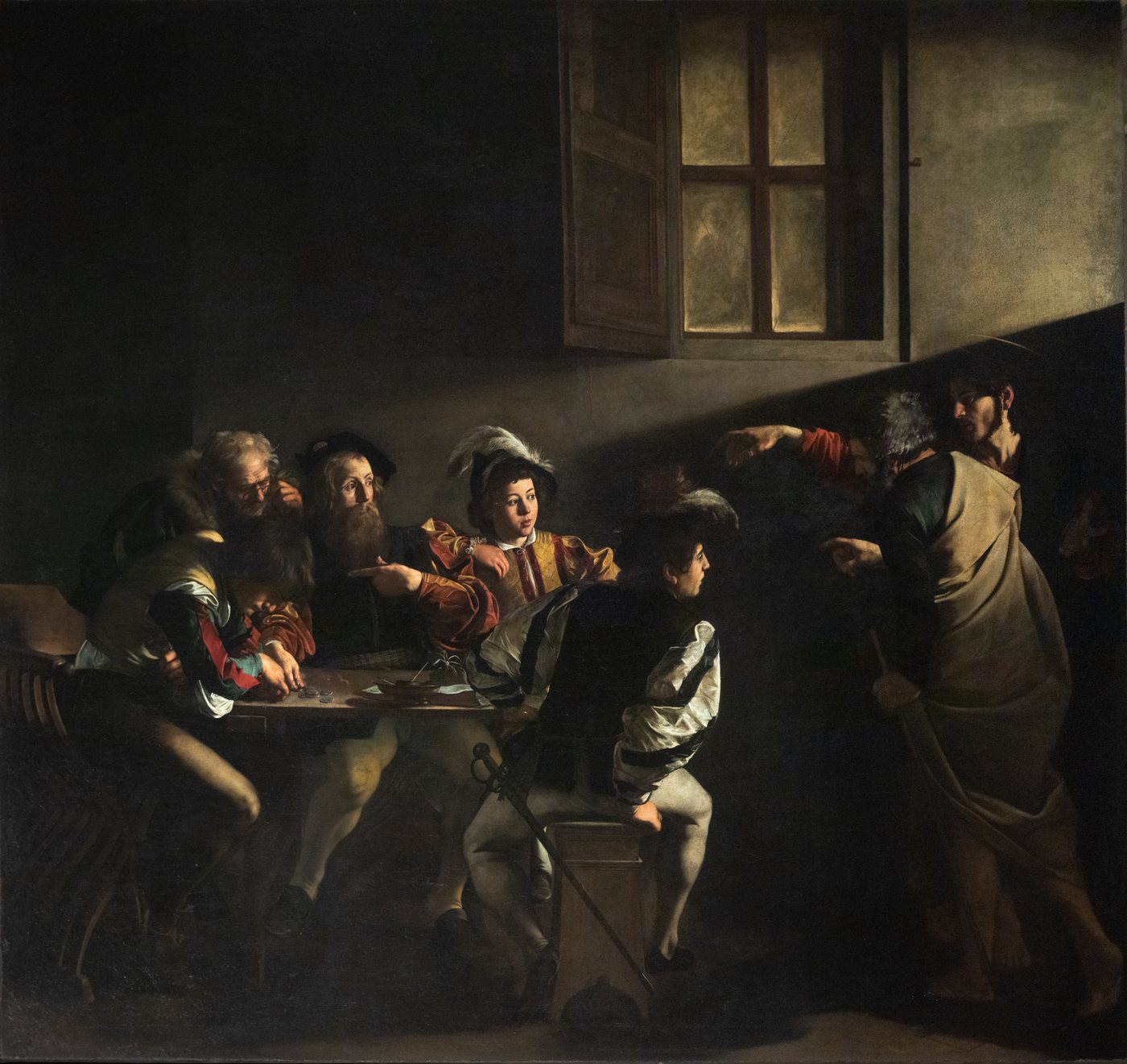 Christ points toward Matthew among a group of men at a table as a band of light crosses the room.
